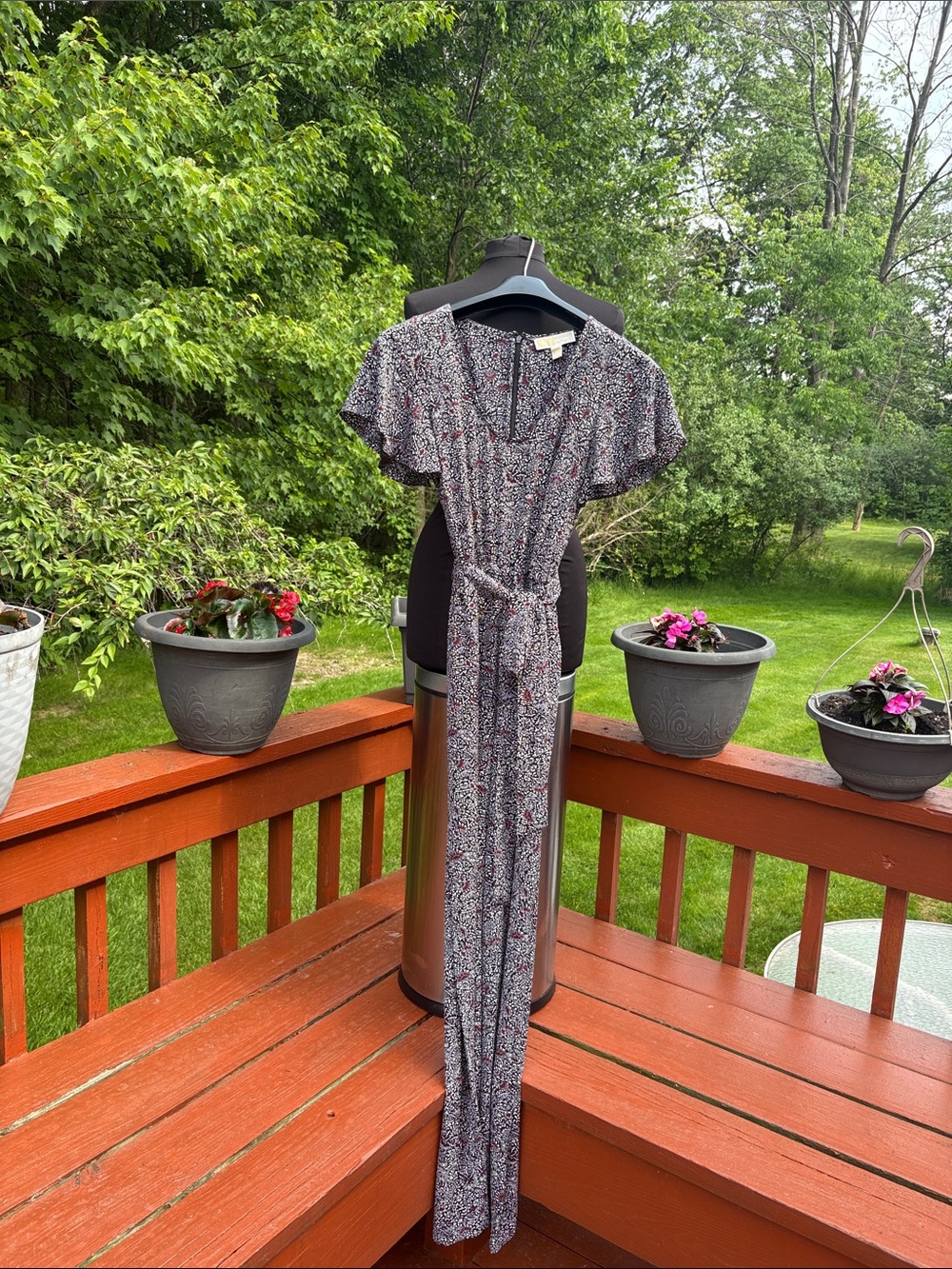 Michael Kors jumpsuit black, white, and burgundy.